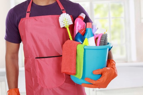 Carpet cleaner preparing safe cleaning equipment before service