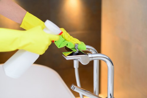 Technician checking carpet cleaning chemicals and safety measures