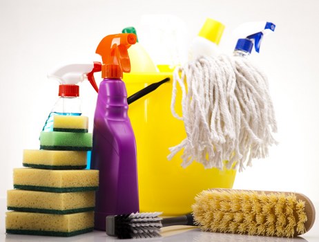Professional carpet cleaners finishing a safe cleaning process