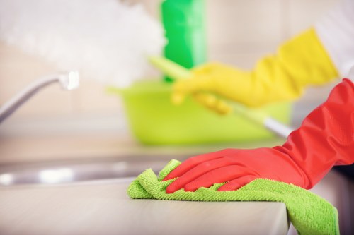 Professional cleaner preparing a Hounslow rental property for handover